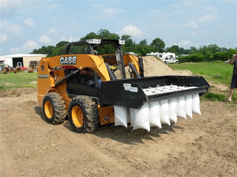 sandbag attachment for skid steer|sand bagging equipment.